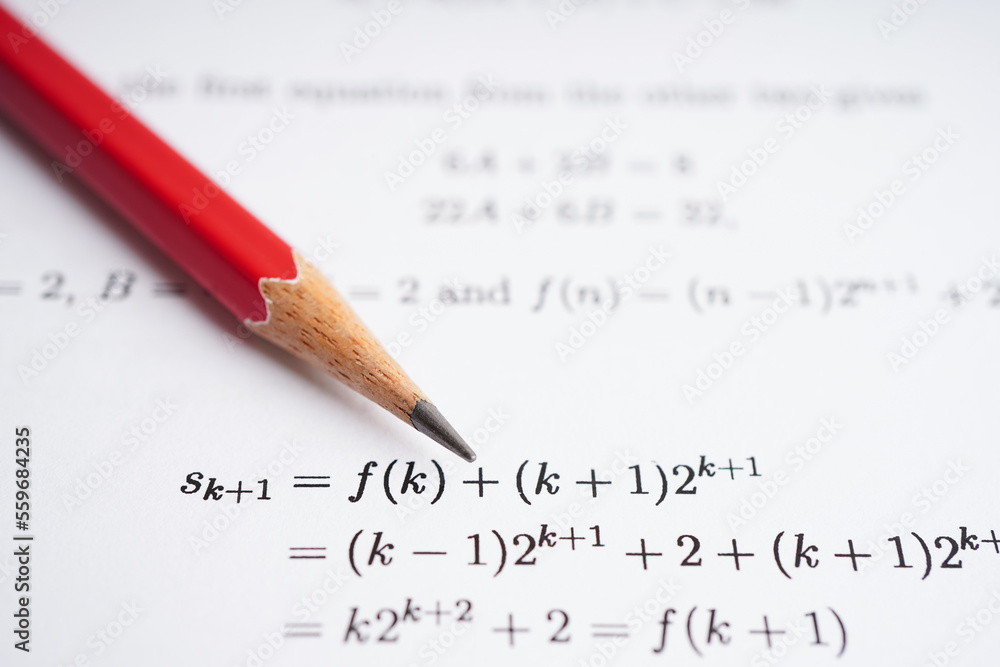 Pencil on mathematic formula exercise test paper in education school. Pencil on mathematic formula exercise test paper in education school.