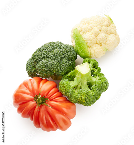 Fresh vegetables arrangement. Tomato, broccoli and cabbage isolated on white background. Healthy food concept