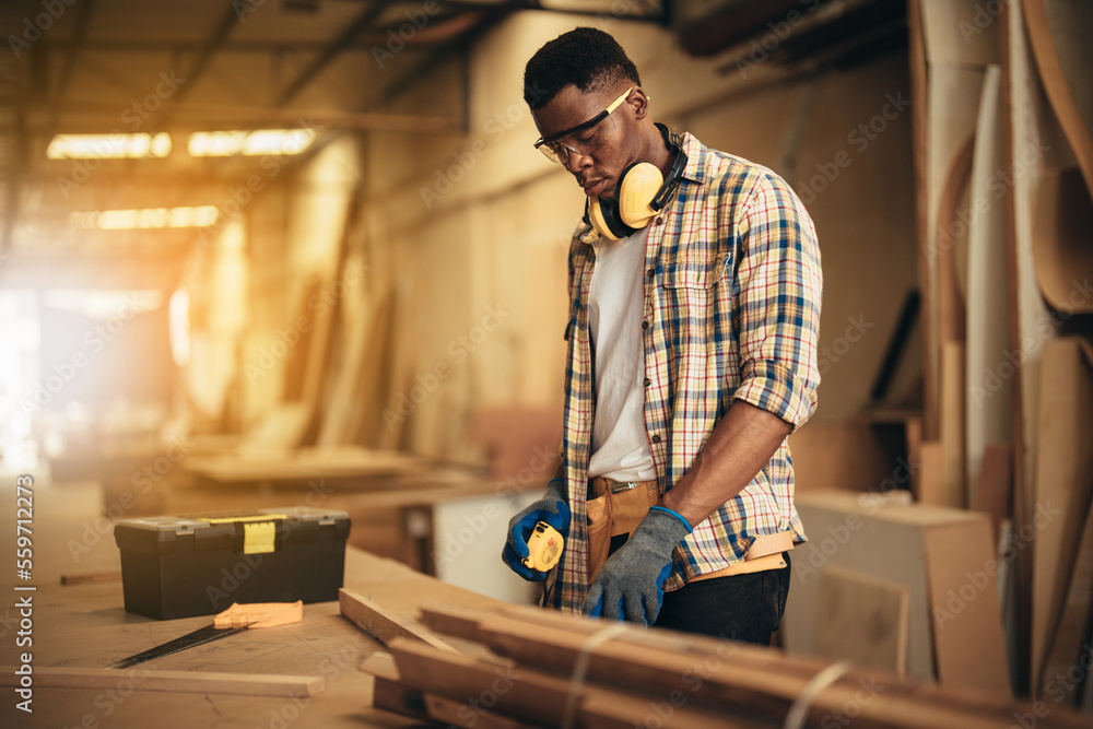 Carpenter man attend to making masterpiece woodworks handcrafted furniture fine measure in wood workshop. Carpenter man attend to making masterpiece woodworks handcrafted furniture fine measure in wood workshop.