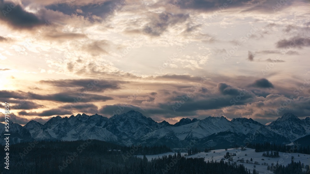 FIXED Establishing shot, view of beautiful Tatra mountain range on a Poland and Slovakia border before sunrise
