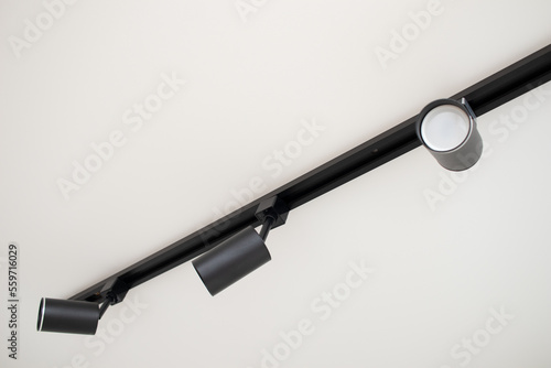 Modern track spot Light on white stretch ceiling