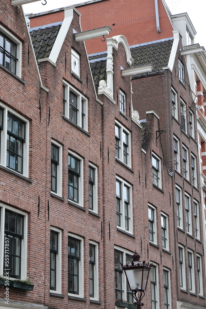 Fototapeta premium Amsterdam Bakkersstraat Street Historic Brick House Facades View, Netherlands