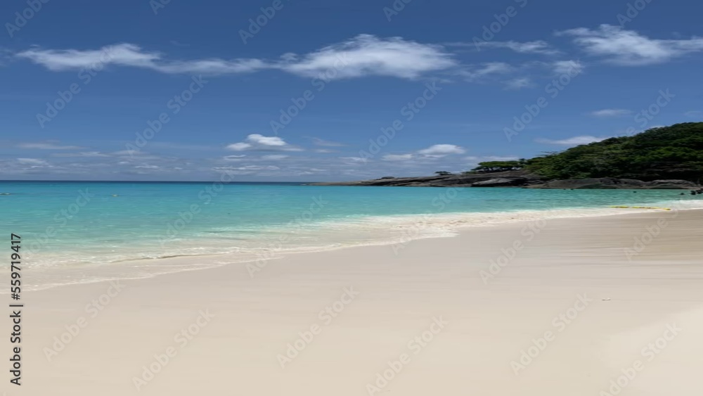 Tropical islands of ocean blue sea water and clear sky at Similan Islands from famous viewpoint, Phang Nga Thailand in a summer day Tropical islands of ocean blue sea water and clear sky at Similan Islands from famous viewpoint, Phang Nga Thailand in a summer day