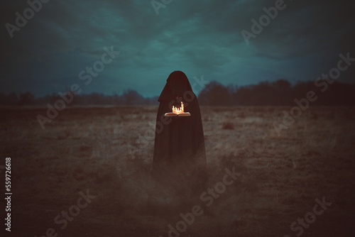 Black wizard with magical book