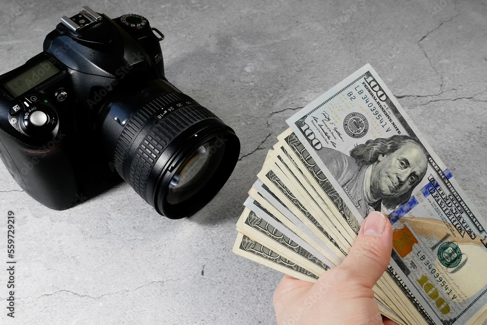 digital camera and money, store selling photographic equipment, pawnshop