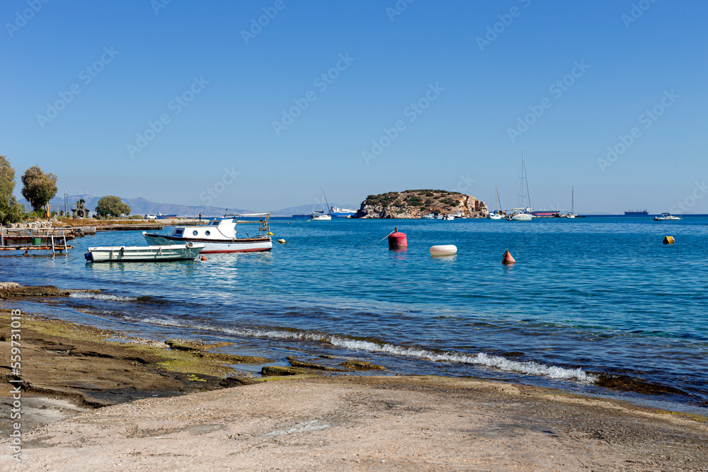 Fishing boats moored near the shore (Greece, Salamis island) close-up