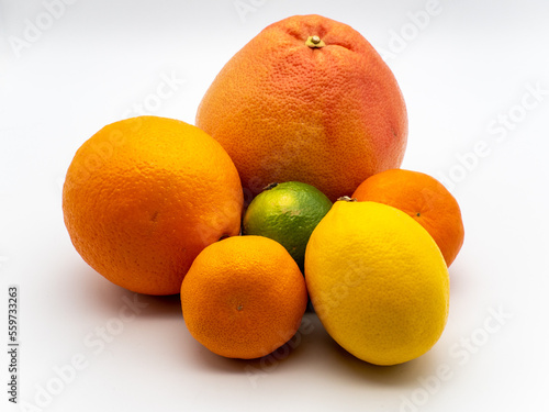 assorted citrus fruits on white
