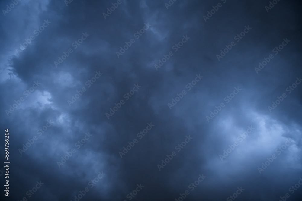 Storm clouds floating in a rainy day with natural light. Cloudscape scenery, overcast weather above blue sky. White and grey clouds scenic nature environment background Storm clouds floating in a rainy day with natural light. Cloudscape scenery, overcast weather above blue sky. White and grey clouds scenic nature environment background