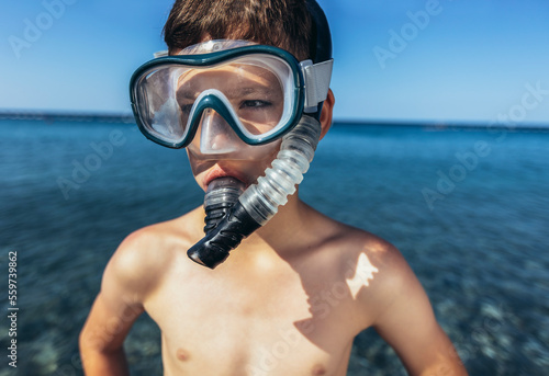 Portrait of a smiling little boy with scuba mask by the sea © Mediteraneo
