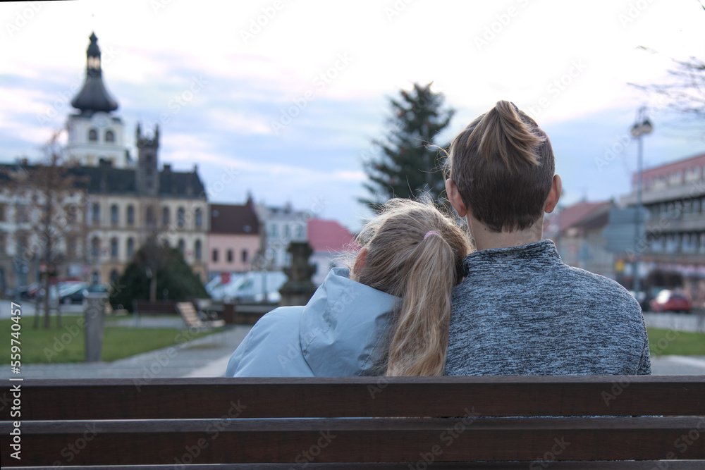 children sit together on a bench. back. friendship . support