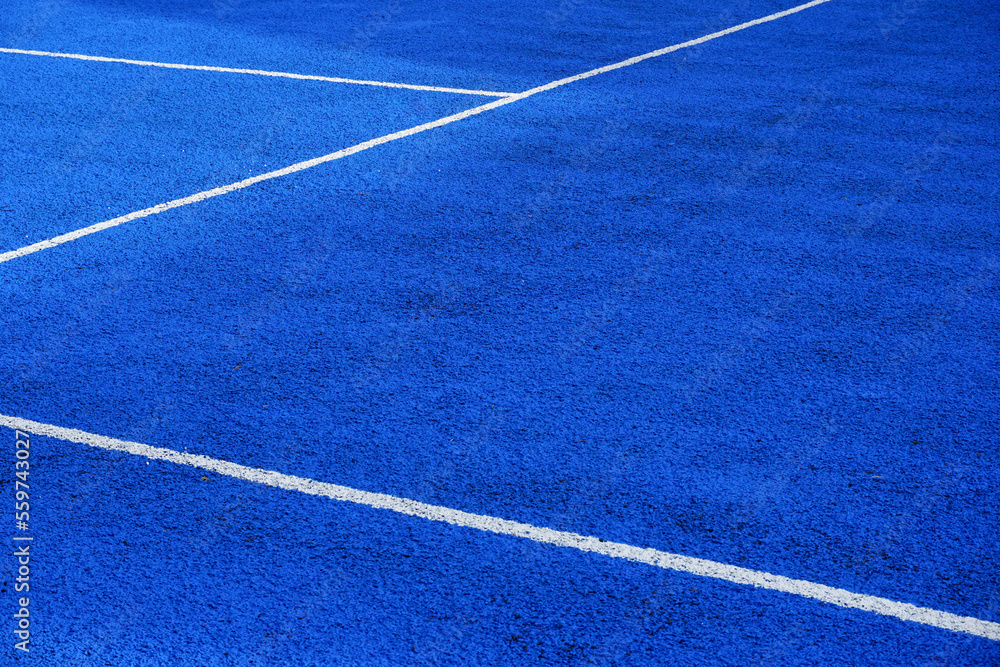 rubber surface of sports ground. tennis and basketball court surface with painted line markings. get active and health concept