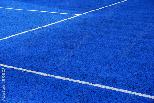 rubber surface of sports ground. tennis and basketball court surface with painted line markings. get active and health concept