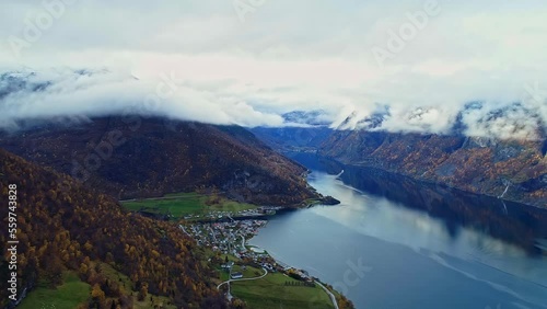 Dramatic Mountain Scenery With Low Clouds During Autumn In Aurlandsfjord, Vestland County, Norway. wide aerial photo