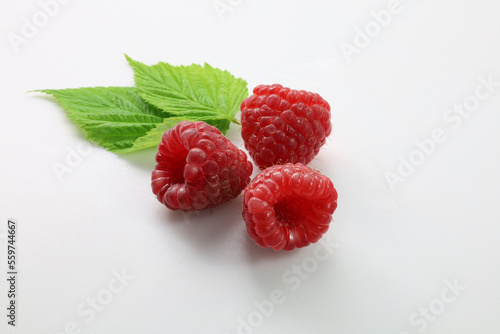 maliny, raspberries on a white background