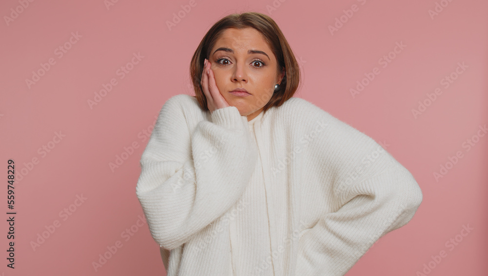 I dont know what to say. Confused woman feeling embarrassed about ambiguous question, having doubts, no idea, being clueless and uncertain. Young girl isolated alone on pink studio wall background I dont know what to say. Confused woman feeling embarrassed about ambiguous question, having doubts, no idea, being clueless and uncertain. Young girl isolated alone on pink studio wall background