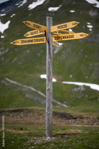 An international streetside sign near the border between Italy and France on the Col du St. Bernard, France. photo
