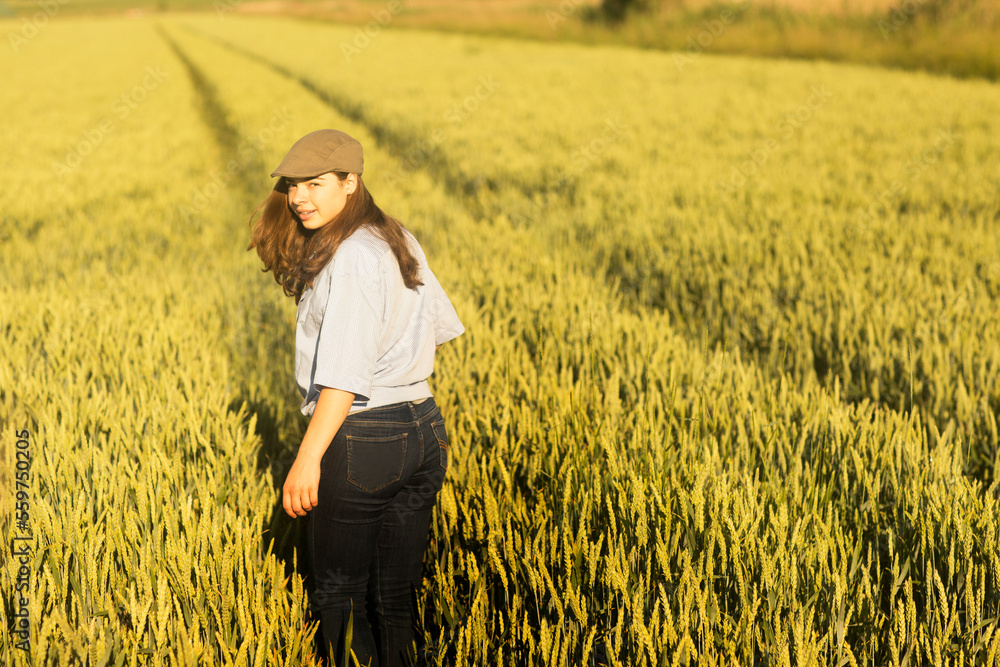 Farmer woman walking through a field