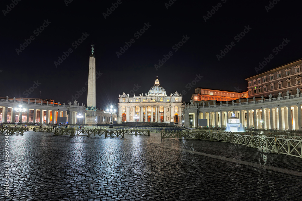 Illuminated cathedral and column at St Peter Square, Rome, Italy Illuminated cathedral and column at St Peter Square, Rome, Italy