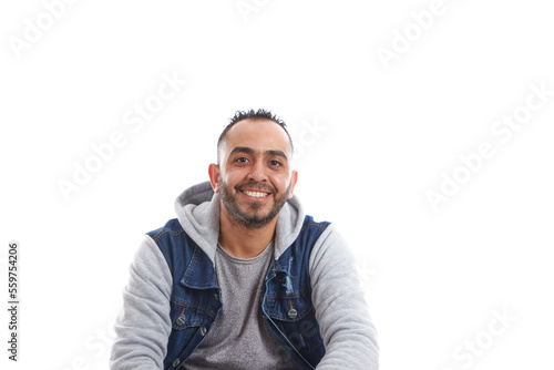 a portrait of an attractive young man in jeans shirt sitting on the chair isolated on white background, happy smiling man sitting on chair.happy emotions.