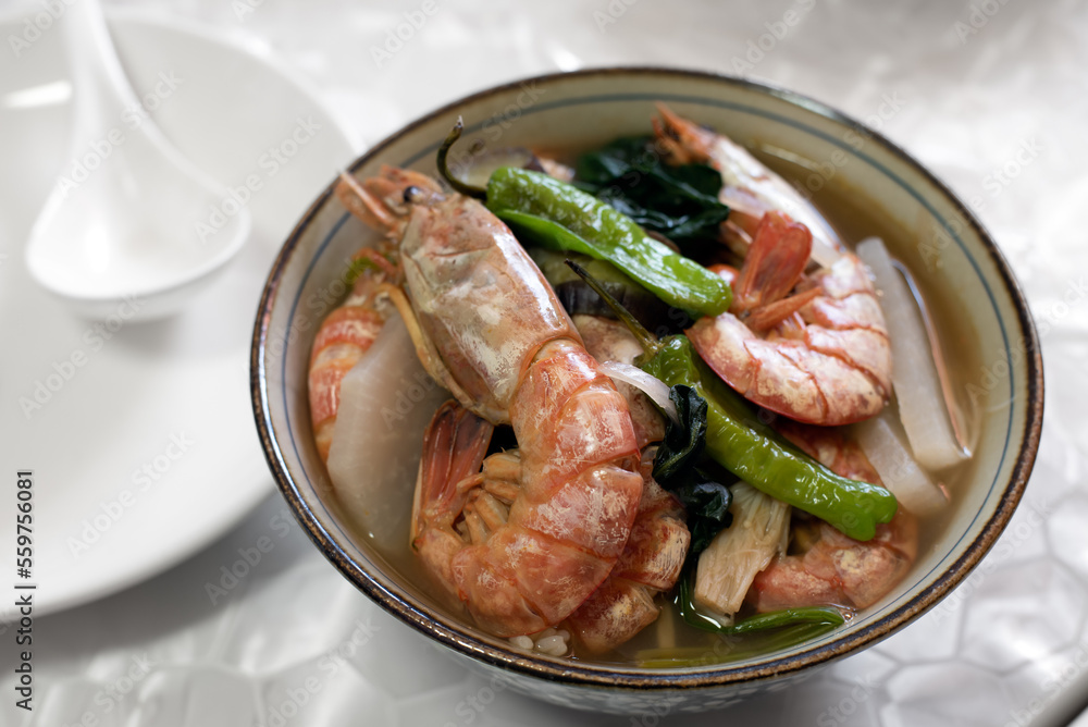 Sinigang na hipon - A Filipino dish of shrimp in a sour broth soup. 