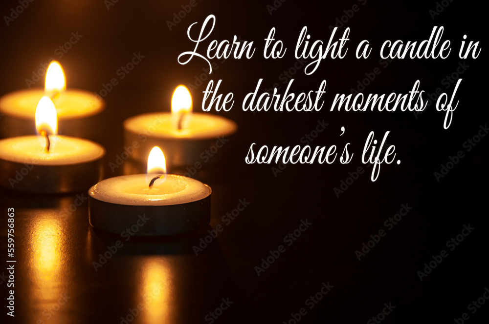 Learn to light a candle in the darkest moment of someone's life quote with candle light background. Motivational concept. Learn to light a candle in the darkest moment of someone's life quote with candle light background. Motivational concept.