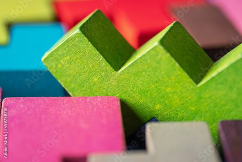 Geometric shapes on a wooden background.