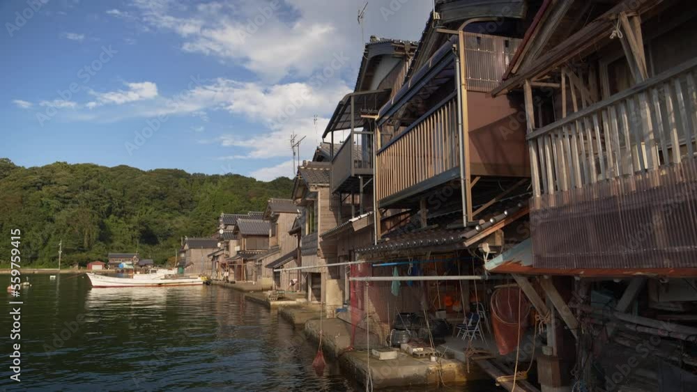 Still shot of The Ine no Funaya (a large cluster of traditional fishermen houses) . Houses are private houses, located in the Ine area of Ine-cho Town, Yosa-gun County, Kyoto Prefecture. Still shot of The Ine no Funaya (a large cluster of traditional fishermen houses) . Houses are private houses, located in the Ine area of Ine-cho Town, Yosa-gun County, Kyoto Prefecture.