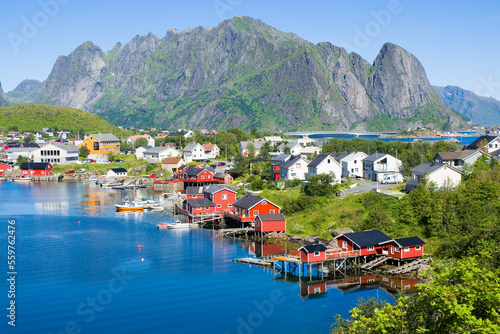 Fishing village with traditional red rorbuer in Reine, Lofoten, Norway