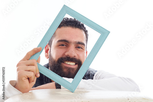 elegant man with beard  in casual wear with face reaction photo