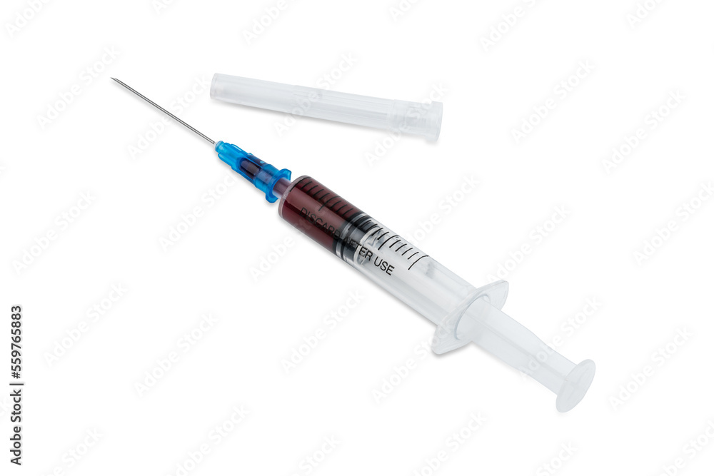 A syringe with blood for a blood test. Medical syringe with dark liquid. Drugs. Vitamins. Medicines. A syringe with blood for a blood test. Medical syringe with dark liquid. Drugs. Vitamins. Medicines.