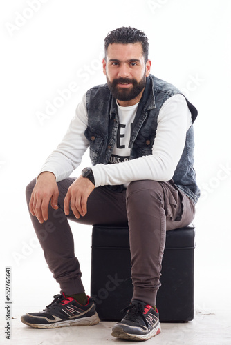 elegant man with beard in casual wear with face reaction