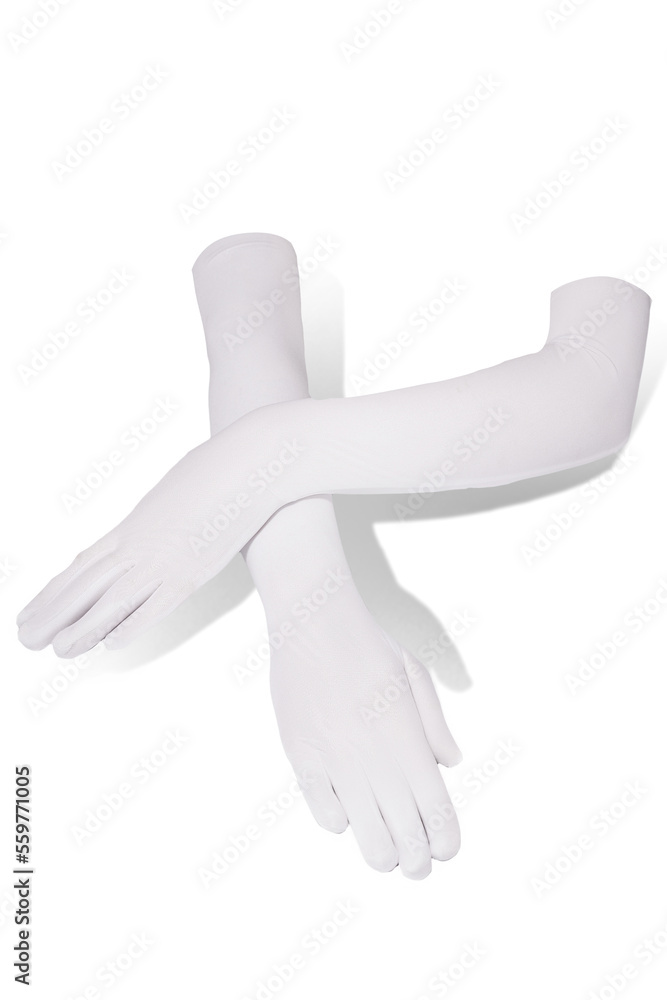 Subject shot of crossed female hands in the elegant white evening elbow gloves made of the soft translucent fabric. The photo is made on the white background. Subject shot of crossed female hands in the elegant white evening elbow gloves made of the soft translucent fabric. The photo is made on the white background.