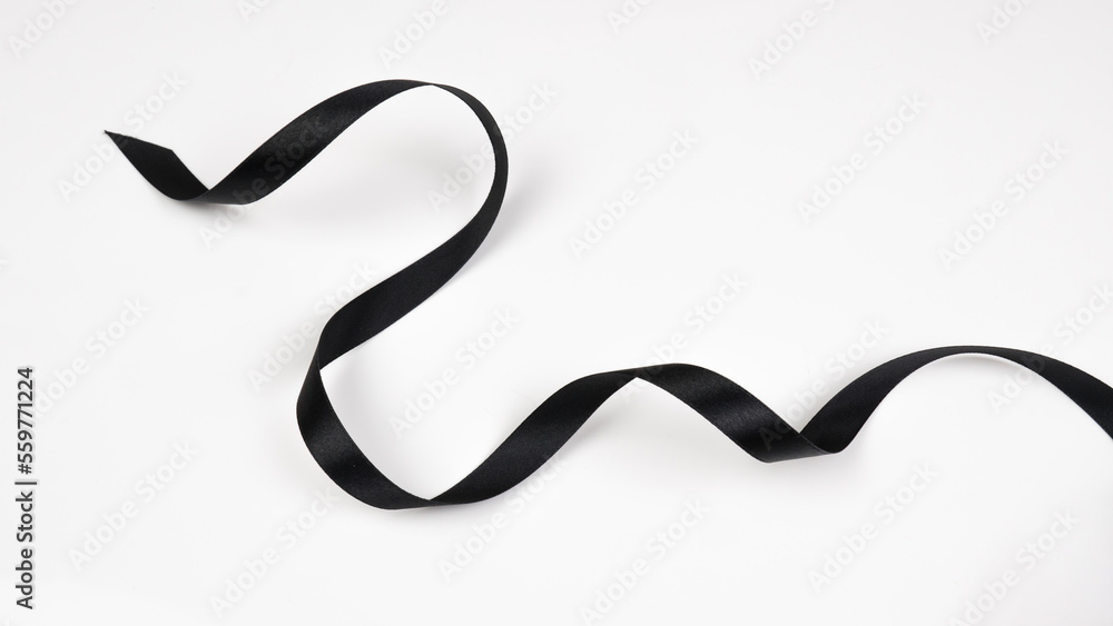 Abstract shape black ribbon isolated on white background. Abstract shape black ribbon isolated on white background.