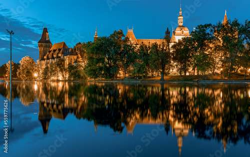 The Castle of Vajdahunyad reflected in the floating lake water. This fort is in the City park of Budapest Hungary. .The city park is cultural center with many famous attractions.