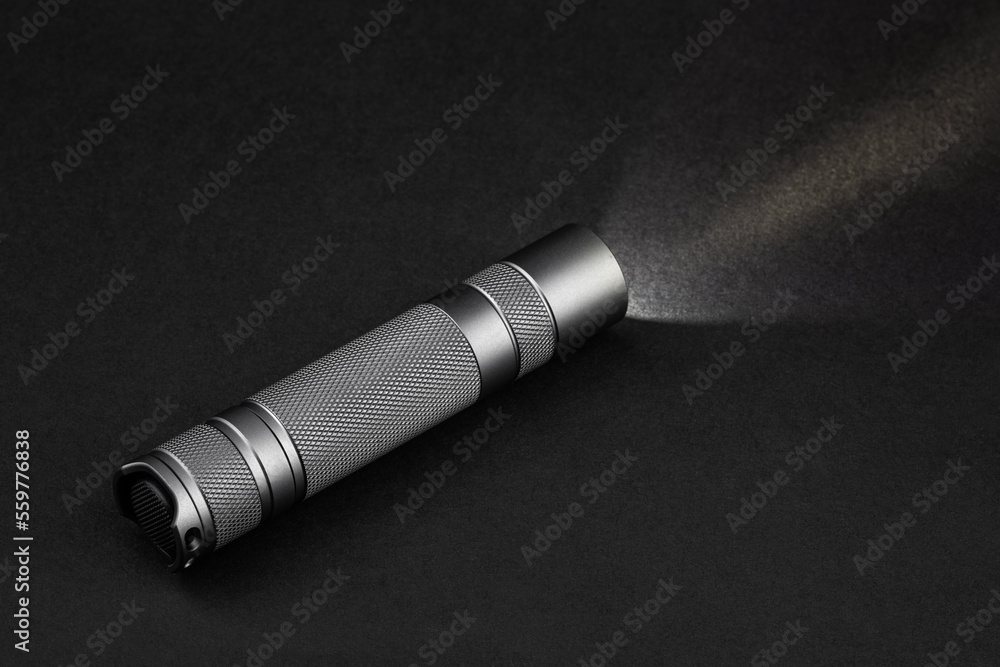 Modern aluminum LED Pocket Flashlight isolated on white background. Modern aluminum LED Pocket Flashlight isolated on white background.