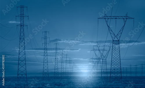 High voltage power lines at sunset