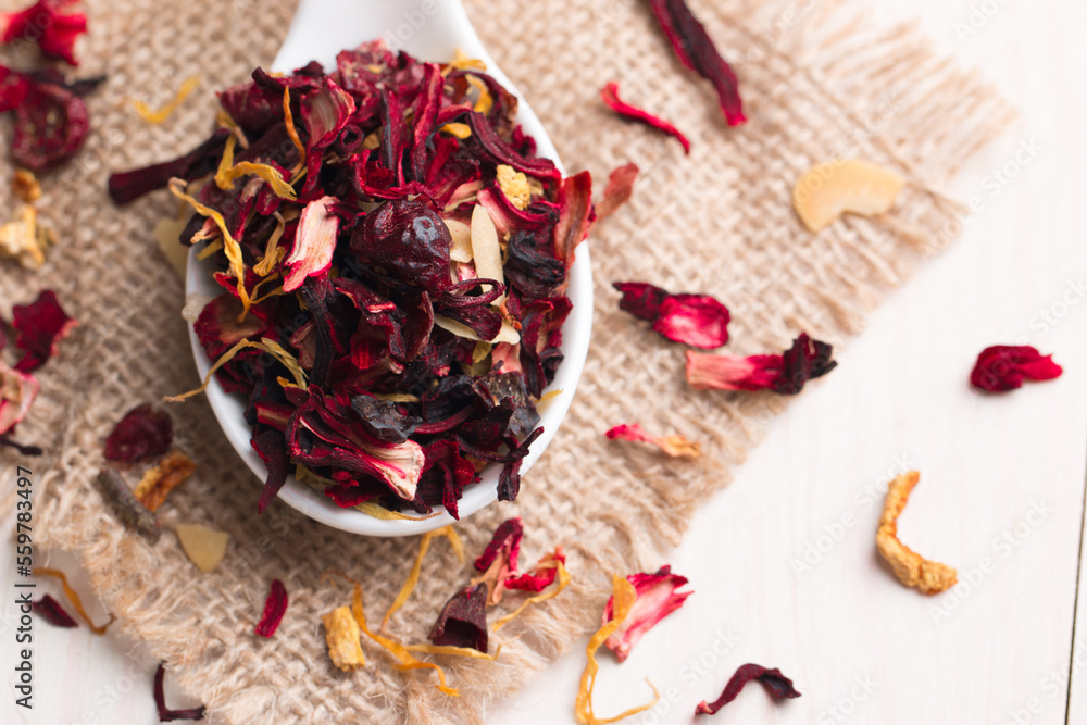 Dry red floral fruit and herbal hibiscus tea with petals 