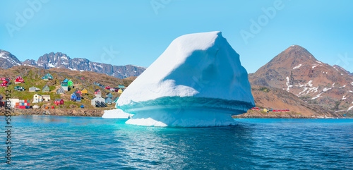 Picturesque village on coast of Greenland - Colorful houses in Tasiilaq, East Greenland photo