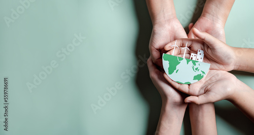 Hands together holding ESG Environmental, environmental, social, and governance in sustainable and ethical business on the Network connection.
