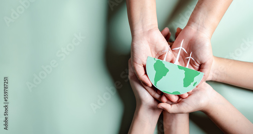 Hands together holding ESG Environmental, environmental, social, and governance in sustainable and ethical business on the Network connection.