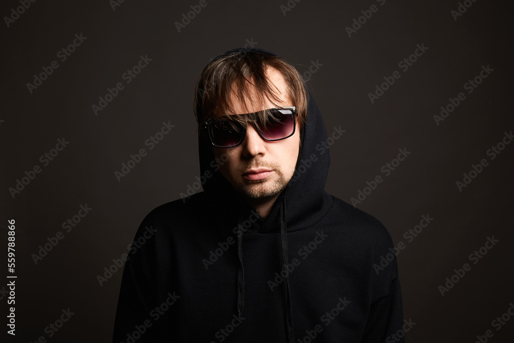 Man in unglasses and hood. Funny Boy Man in unglasses and hood. Funny Boy