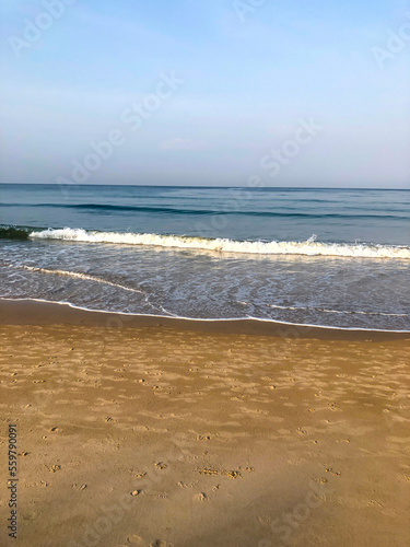 beach, palm trees and Andaman sea in Thailand on Phuket island