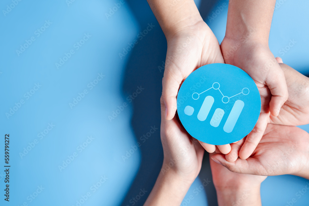 Hands holding chart growth with business target planning development leadership and customer target group, investment growth and success development, achievement, goal, strategy, finance concept. Hands holding chart growth with business target planning development leadership and customer target group, investment growth and success development, achievement, goal, strategy, finance concept.