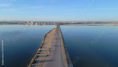 Wallpaper Mural Aerial view of Embankment promenade surrounded by the calm sea water with a San Pedro Del Pinatar touristic city in a background. Costa Blanca region in Spain Torontodigital.ca