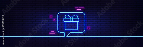 Neon light glow effect. Dreaming of Gift line icon. Present box sign. Birthday Shopping symbol. Package in Gift Wrap. 3d line neon glow icon. Brick wall banner. Wish list outline. Vector