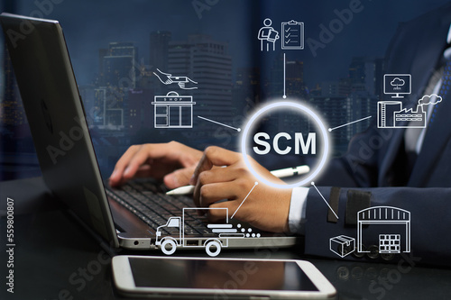 businessman analyze supply chain management ( SCM )   photo