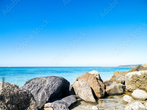 Stones on beach in Vada, Italy.