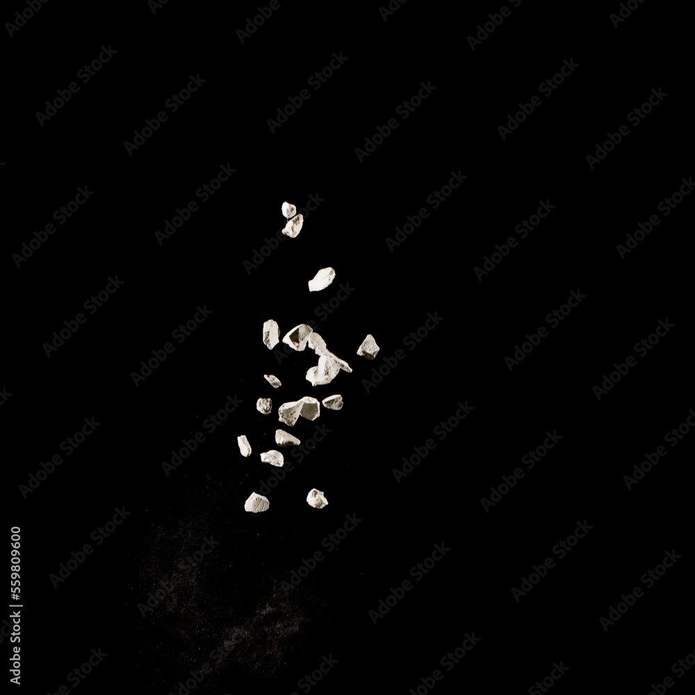 Mixed stone explosion on black background. Mixed stone explosion on black background.