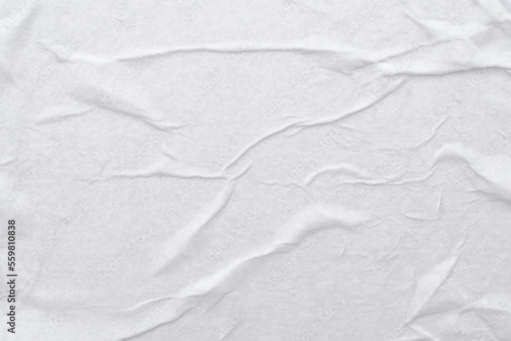 Obraz premium Texture of crumpled wet white paper with folds. writing paper