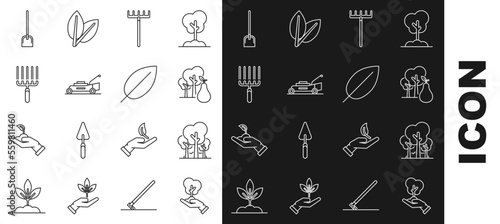 Set line Tree in hand of environmental protection, Trees, with pears, Garden rake, Lawn mower, work, Shovel and Leaf icon. Vector